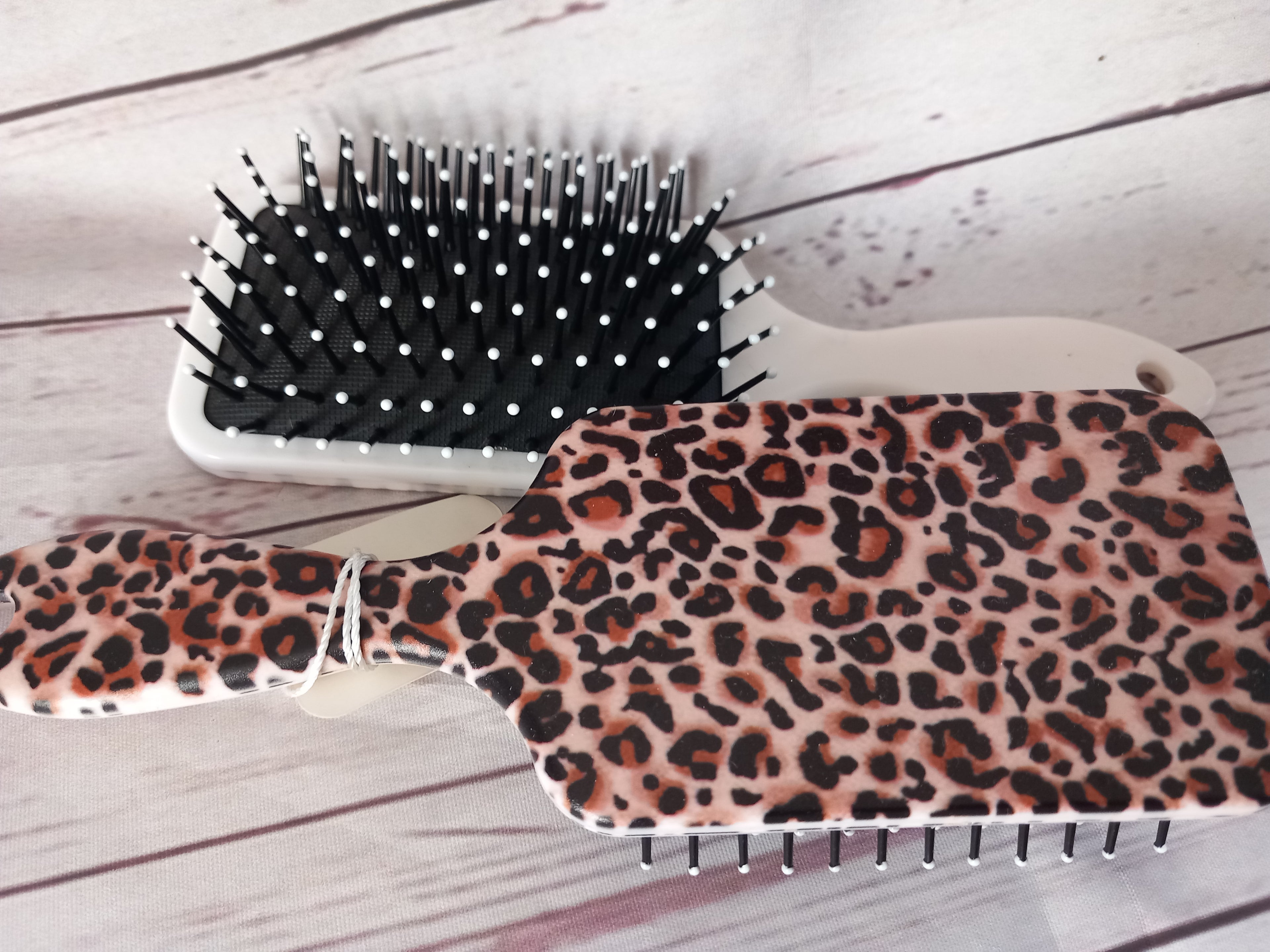 Animal print paddle brush for detangling Hair extensions and wigs