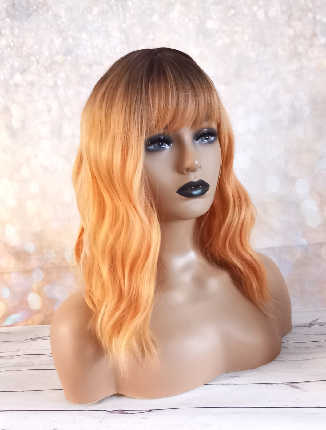 Clearance- Immediate despatch- golden amber yellow rooted Fibre bob wig, synthetic, fringe, bangs, 8 inches long, wavy texture